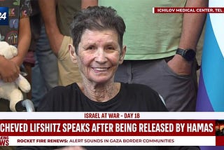 Yocheved Lifshitz smiling in her first interview following release by Hamas.