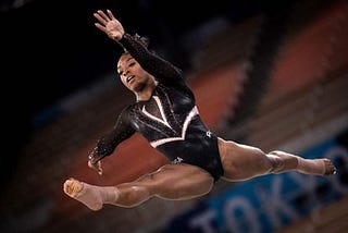 Biles Bows Out