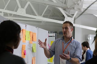 What are the challenges for organisations adopting design thinking?