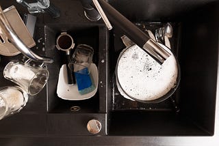 the spoon is still in the sink
