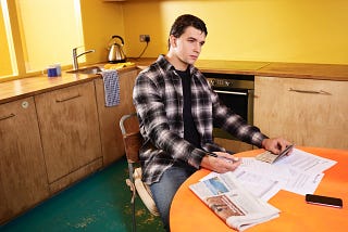 man sitting at table