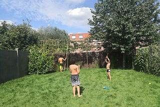 My three boys playing Tarzan