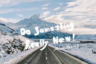 A mountain background with quote “do something really new!” on it.
