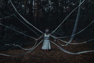 Girl tied up in jungle