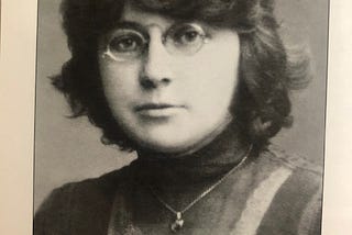 Young Marina Cvetaeva’s portrait. She is wearing glasses.