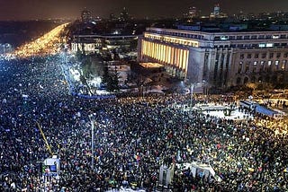 Why has the global open government community been silent on Romania?