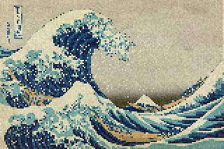 A wave rises on the horizon