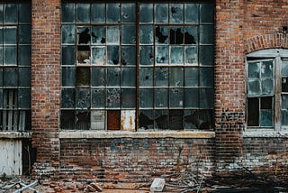 Abandoned building with broken windows