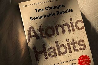 An image of the Atomic Habits book cover written by James Clear