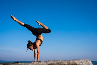 Woman doing yoga — vegan protein