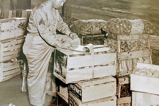 An enlisted Army Master Sergeant is doing inventory in an Army mess area on an Army base at Los Almos, New Mexico during WWII and The Manhattan Project.