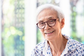 elderly woman with glasses