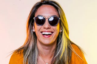 Woman in her late 40s smiling like a content creator