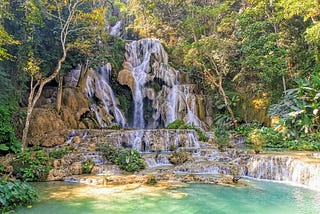 Limestone-Like Natural Pools And A Spectacular Cascade