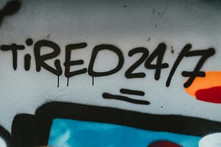 Picture with the words — Tired 24/7