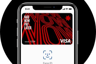 A view of a red and black NAB card in an Apple Wallet on an iPhone. The card says ‘NAB Now Pay Later’ and ‘Visa’.