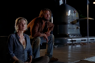 Juliet and Sawyer from Lost on a doc.