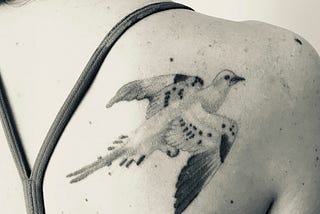 9 Tattoos of Extinct and Imperiled Species