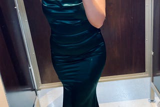 The Woman in the Emerald Gown