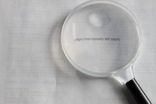 photo of a page saying “page intentionally left blank”