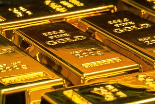 5 bars of shiny gold bullion