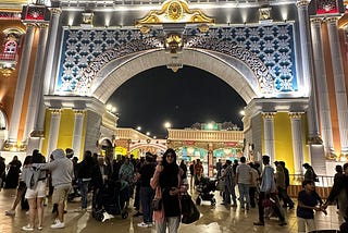 Thumbs up in front of the Europe Pavilion at Global Village.