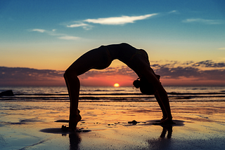 Woman Doing a Yoga Asana: Back Bend