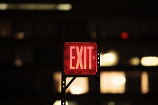 Red exit sign.