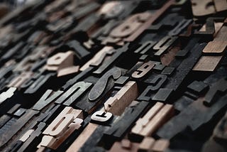 Image of black and bronze letters