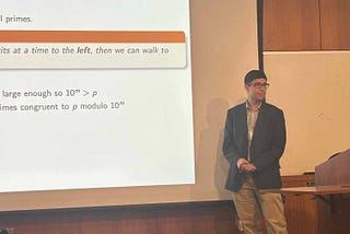 Joshua Siktar presenting a number theory talk