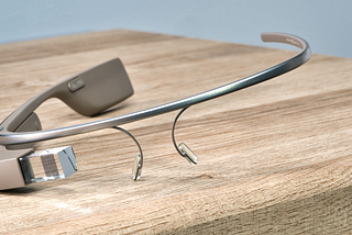 A photo of Google Glasses, the spectacle frame that has a small display.