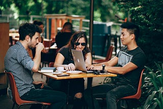 Engaged employees are having a meeting outside