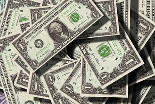 The Executive Pay Grab