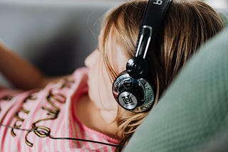 Girl in Modern Headphones Listening to Music by Karolina Grabowska on Pexels.com