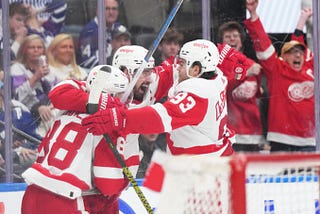 As the Detroit Red Wings clinched a crucial overtime victory, their road to the playoffs became…