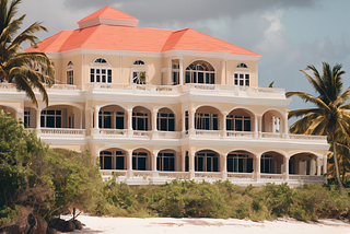 A luxury hotel on a tropical island next to the beach