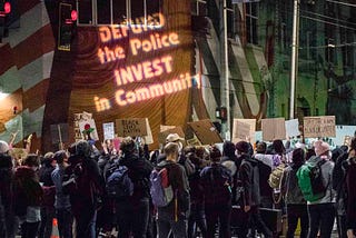 Why calls to defund the police are actually an intersectional call to investment and action