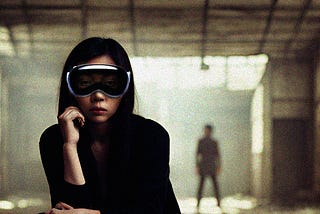 A Person wearing the Apple vision Pro in a dystopic built environments