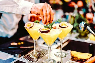 Yellow highball cocktails. Photo by Frames For Your Heart on Unsplash