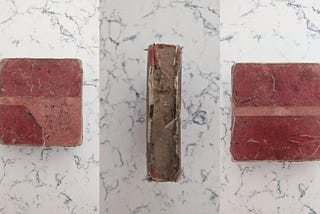 a red book tryptych: front (L), spine (M), back (R)