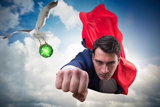 Superman in a business suit flying towards you. There is a seagull flying towards him holding a piece of kryptonite.