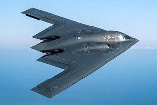 B-2 bomber in flight, it is shaped a little like a Dorito chip.