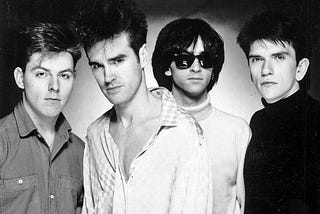 The Smiths in 1985 (Wikipedia/Paul Cox/Sire Records).