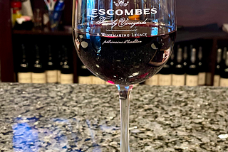 A glass of D.H. Lescombes’s signature deep red Cab-Sangio (Cabernet Sauvignon, Sangiovese)