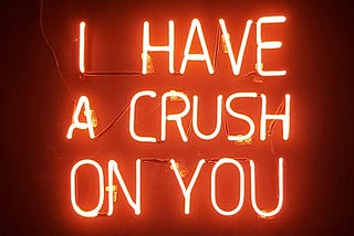 “I have a crush on you” in a red neon sign