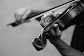 The Violinist on the Beach