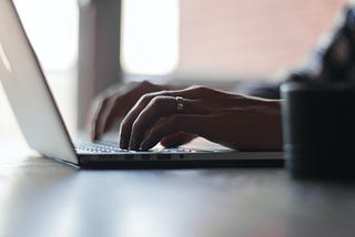 Person typing on computer. Copyright: Glenn Carstens-Peters: Editorial, Business & Work (https://unsplash.com/photos/npxXWgQ33ZQ)