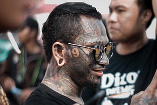 What Face Tattoo Should You Get Based on Your Enneagram Number?