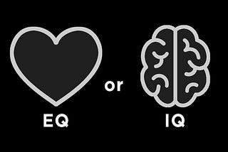 A heart emoji compared to a brain emoji to discuss emotion versus intelligence in Renee Ure’s article about emotional intelligence.