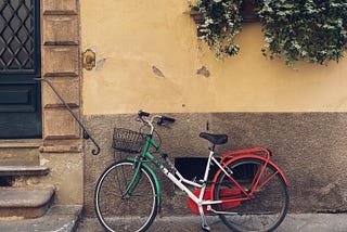 Photo of a bike painted in the Italian flag's colours: green, white and red